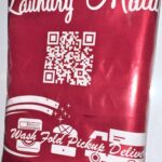 A red bag with a qr code on it.