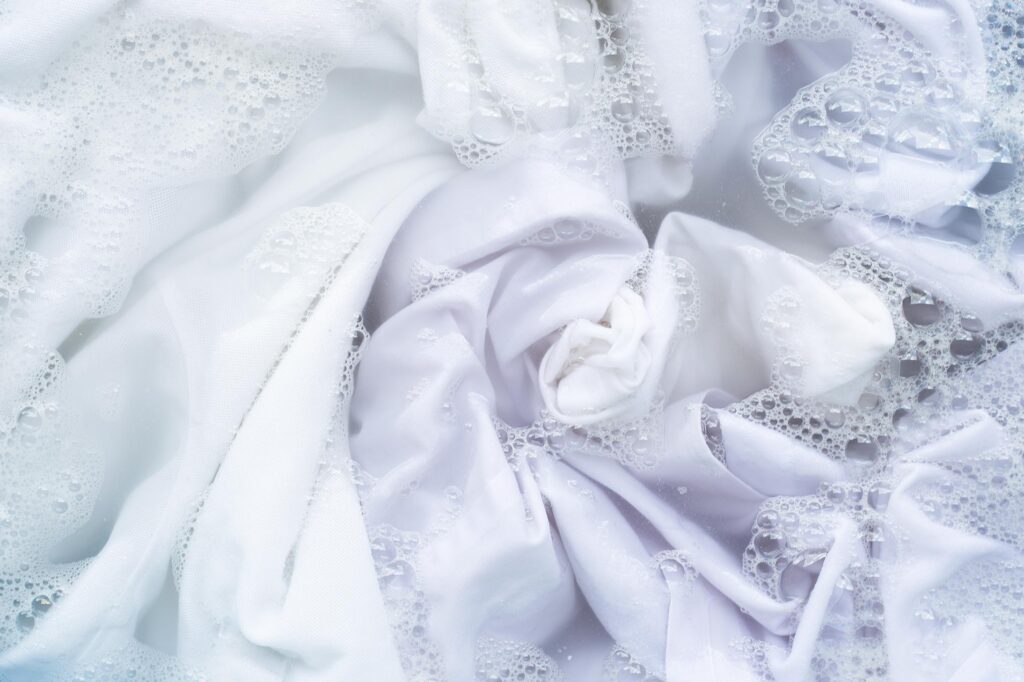 A white cloth with lace on it