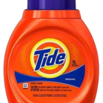 A bottle of tide detergent on top of a table.